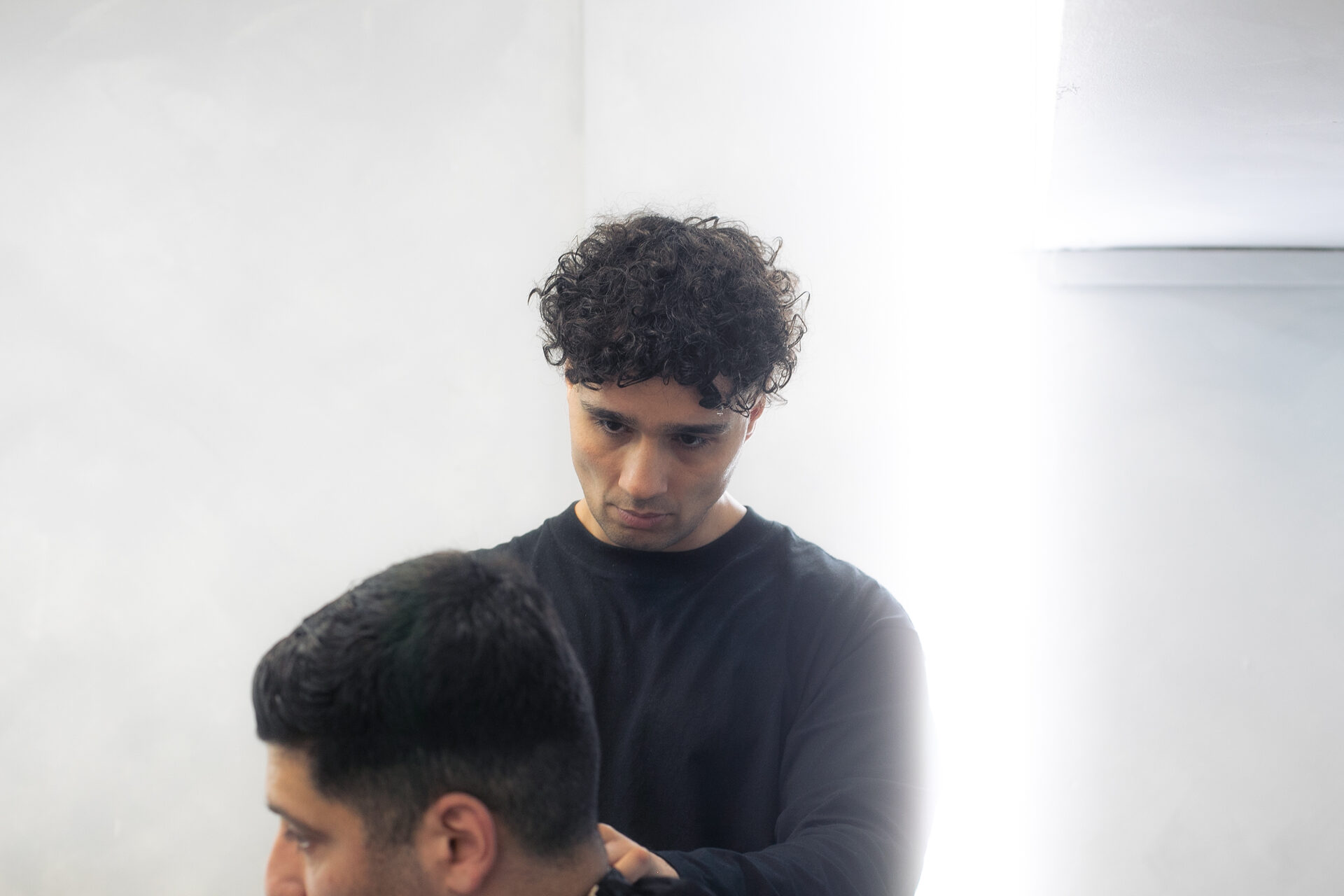 Barbering training on the floor at Stylesbydutch Education in Manchester